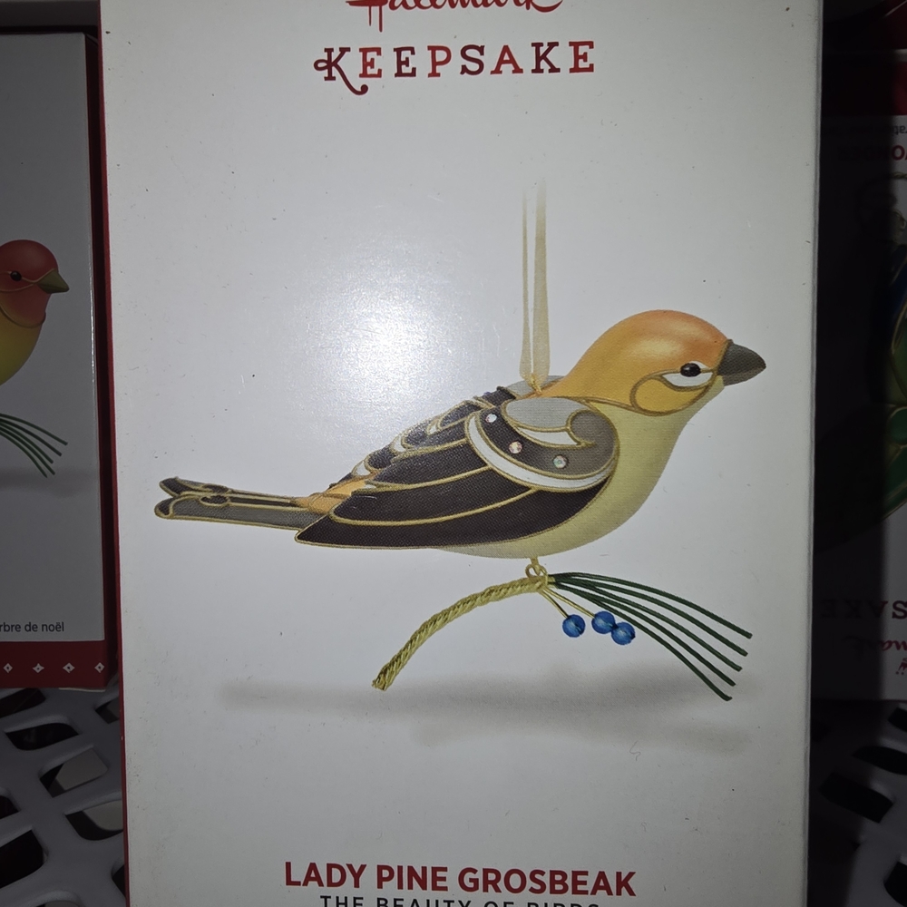 Lady Pine Grosbeak Ornament - Yellow and Brown